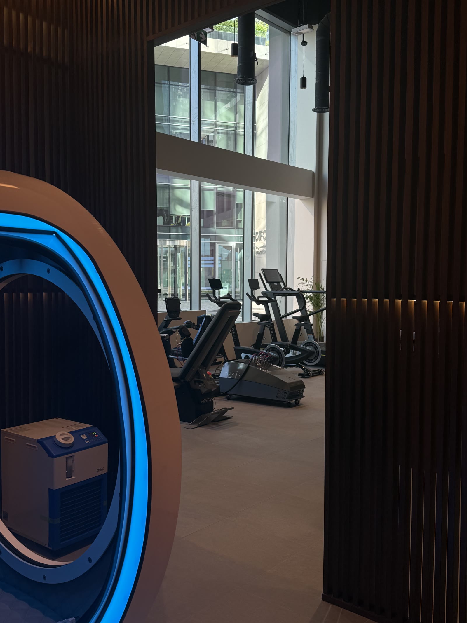 Cryotherapy chamber overlooking the training floor